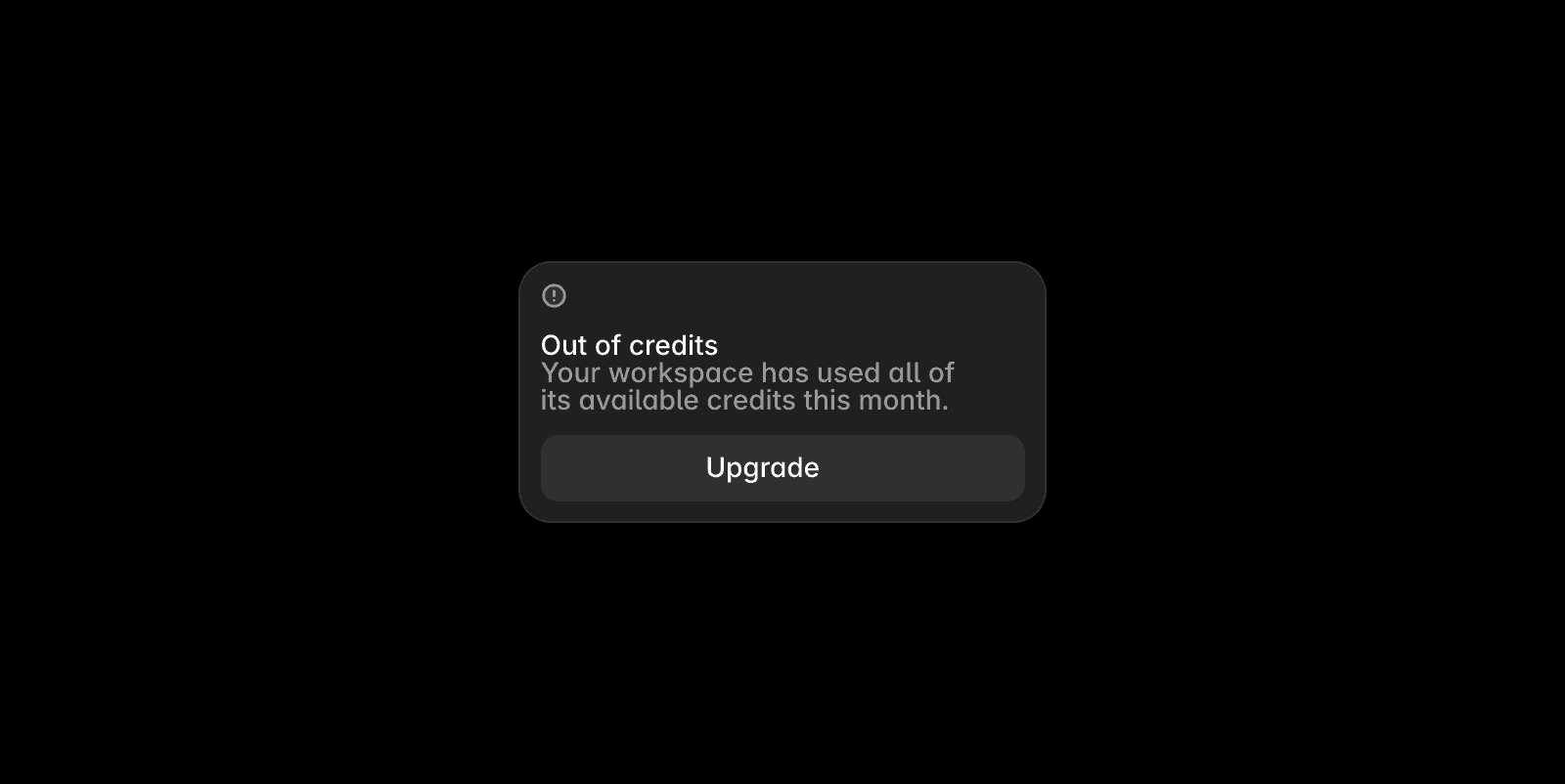 Dark screen showing a centered modal dialog with the message: “Out of credits. Your workspace has used all of its available credits this month.” Below the message is a large “Upgrade” button. The rest of the screen is black, drawing attention to the warning dialog.