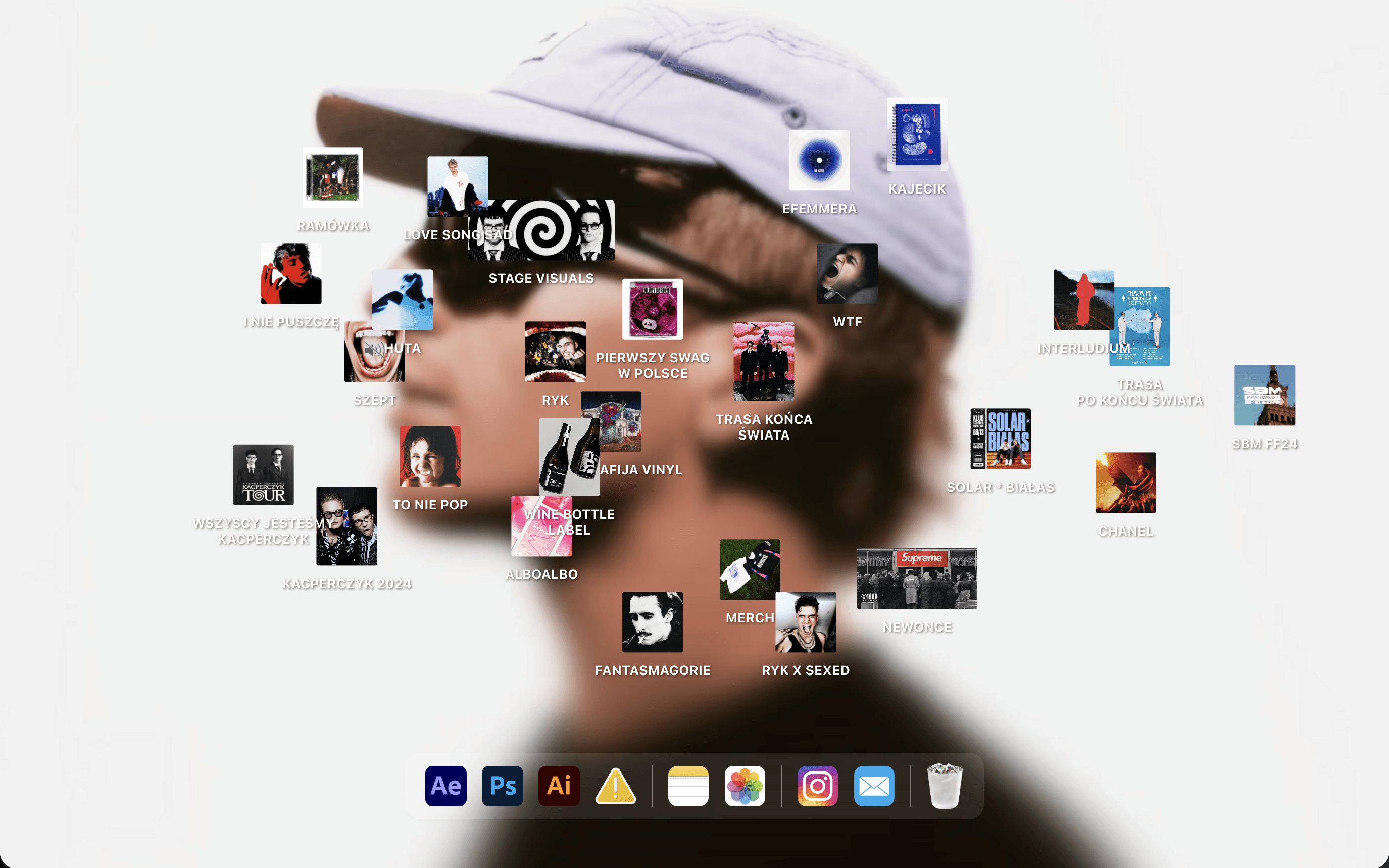 Designer portfolio arranged like a computer desktop with project thumbnails over a blurred portrait